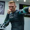 Advanced Performance: Hooks Long Sleeve BJJ Rash Guard - Dark Lights