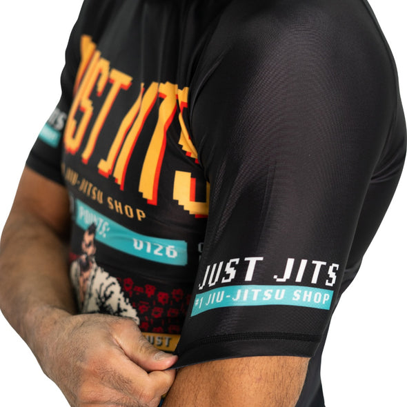 Explore the comfort and style of Just Jits Short Sleeve Rashguard - 8 Bit Jits Out